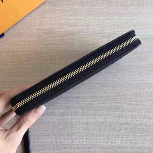 M60571 Zippy Wallet Monogram Empreinte Leather