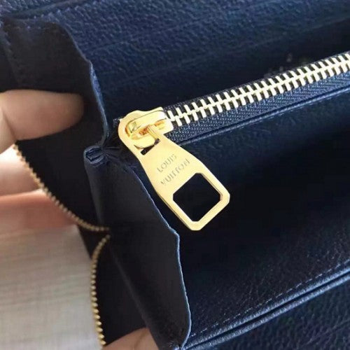 M60571 Zippy Wallet Monogram Empreinte Leather