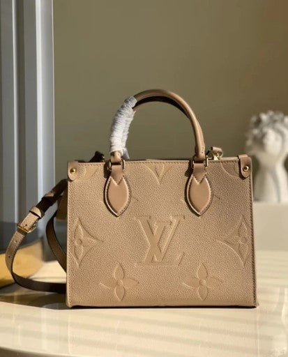 M44570 LV CARMEL HOBO BAG MAHINA LEATHER BEIGE MM