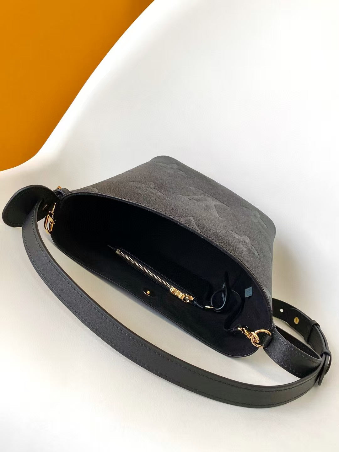 M40817 Bucket Shoulder Bag Monogram Embossed Black Color.