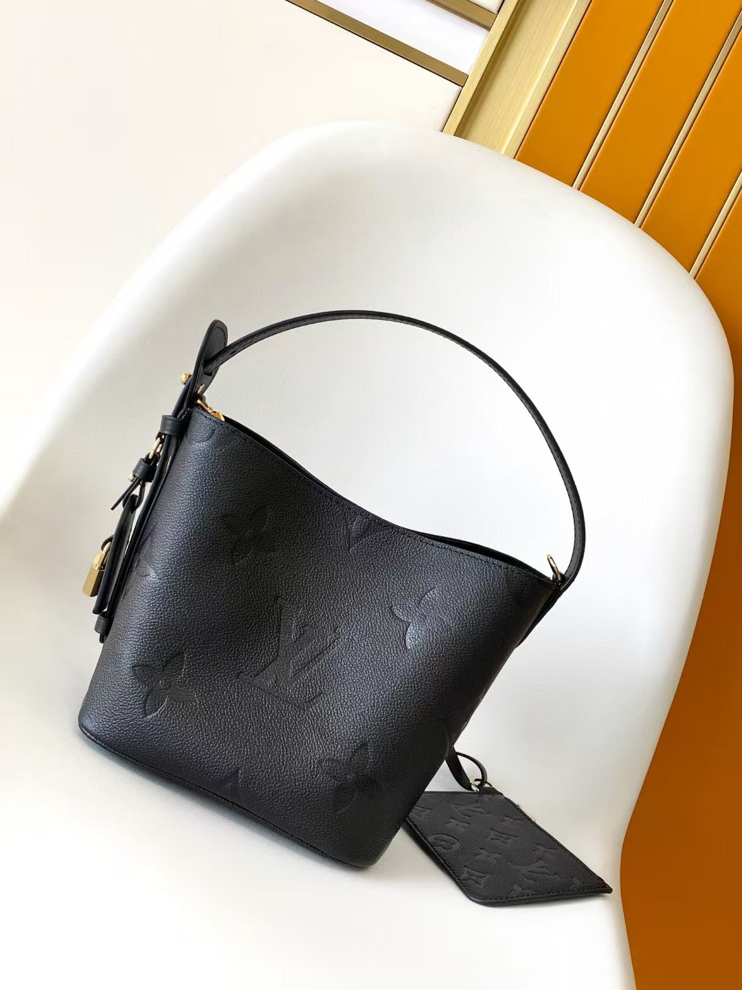 M40817 Bucket Shoulder Bag Monogram Embossed Black Color.
