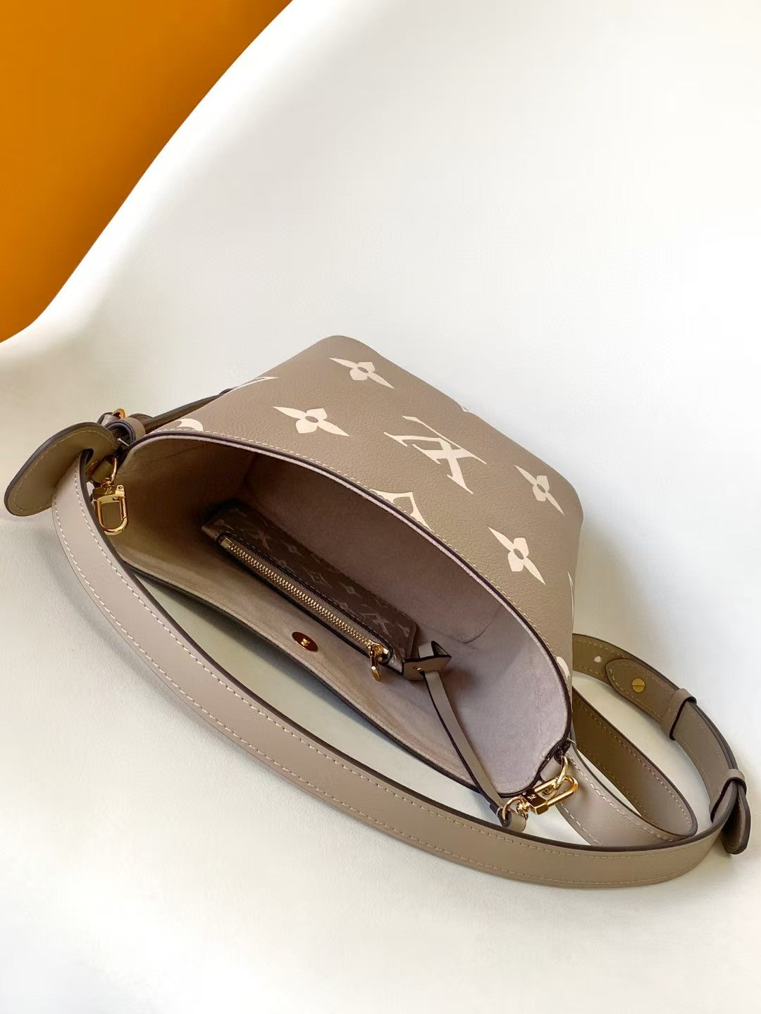 M40817 Bucket Shoulder Bag Monogram Embossed Grey Color.