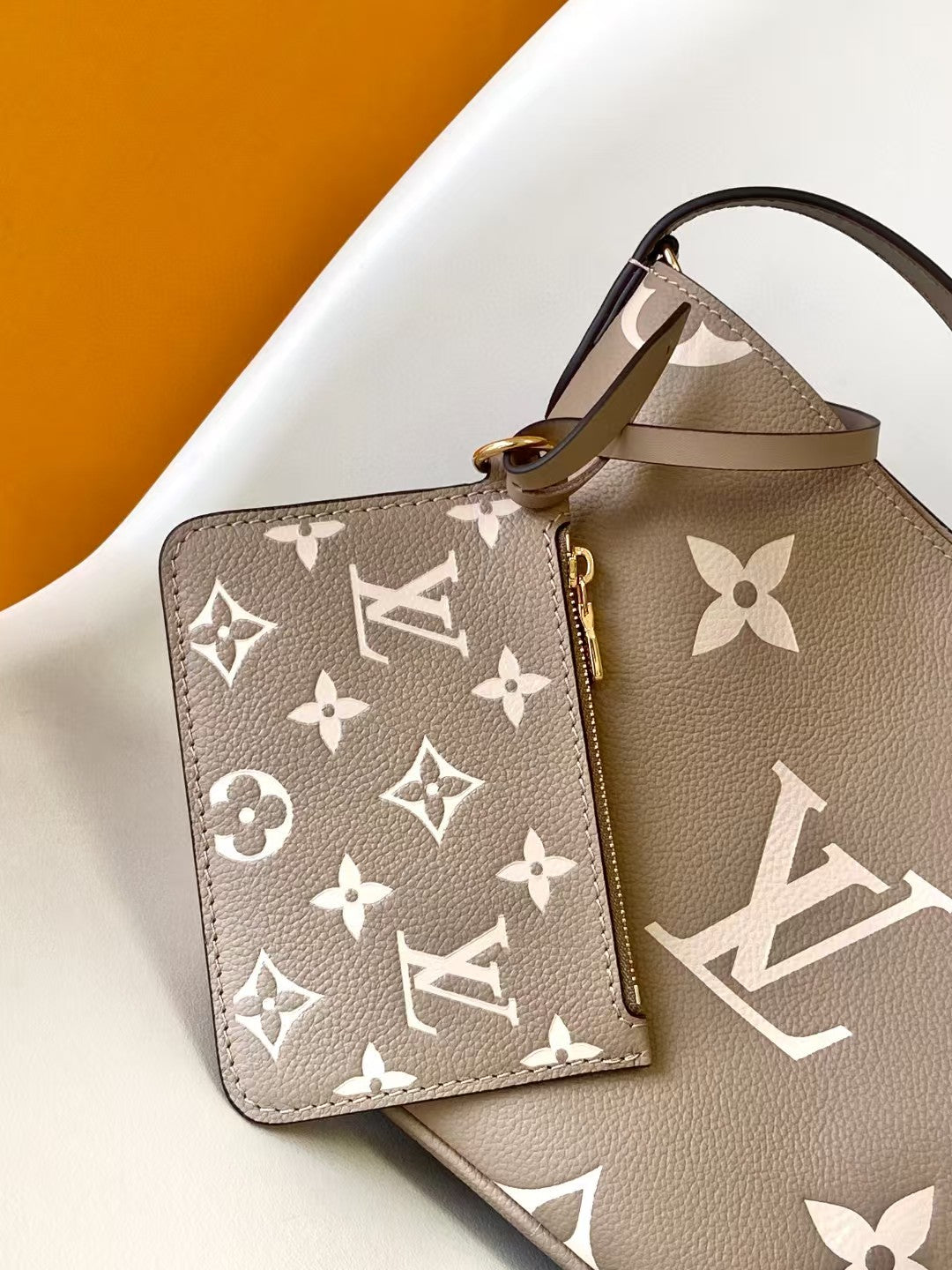 M40817 Bucket Shoulder Bag Monogram Embossed Grey Color.