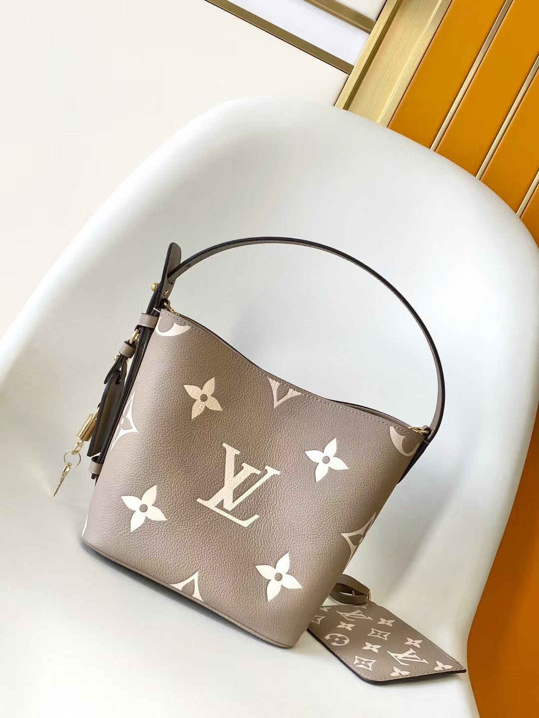 M40817 Bucket Shoulder Bag Monogram Embossed Grey Color.