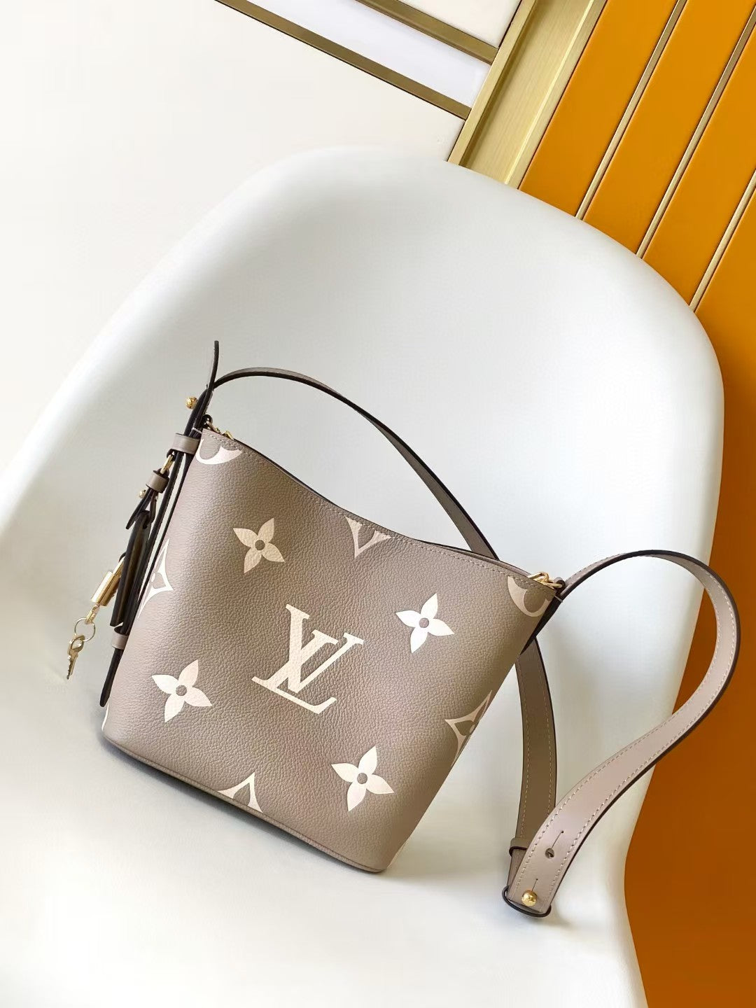 M40817 Bucket Shoulder Bag Monogram Embossed Grey Color.