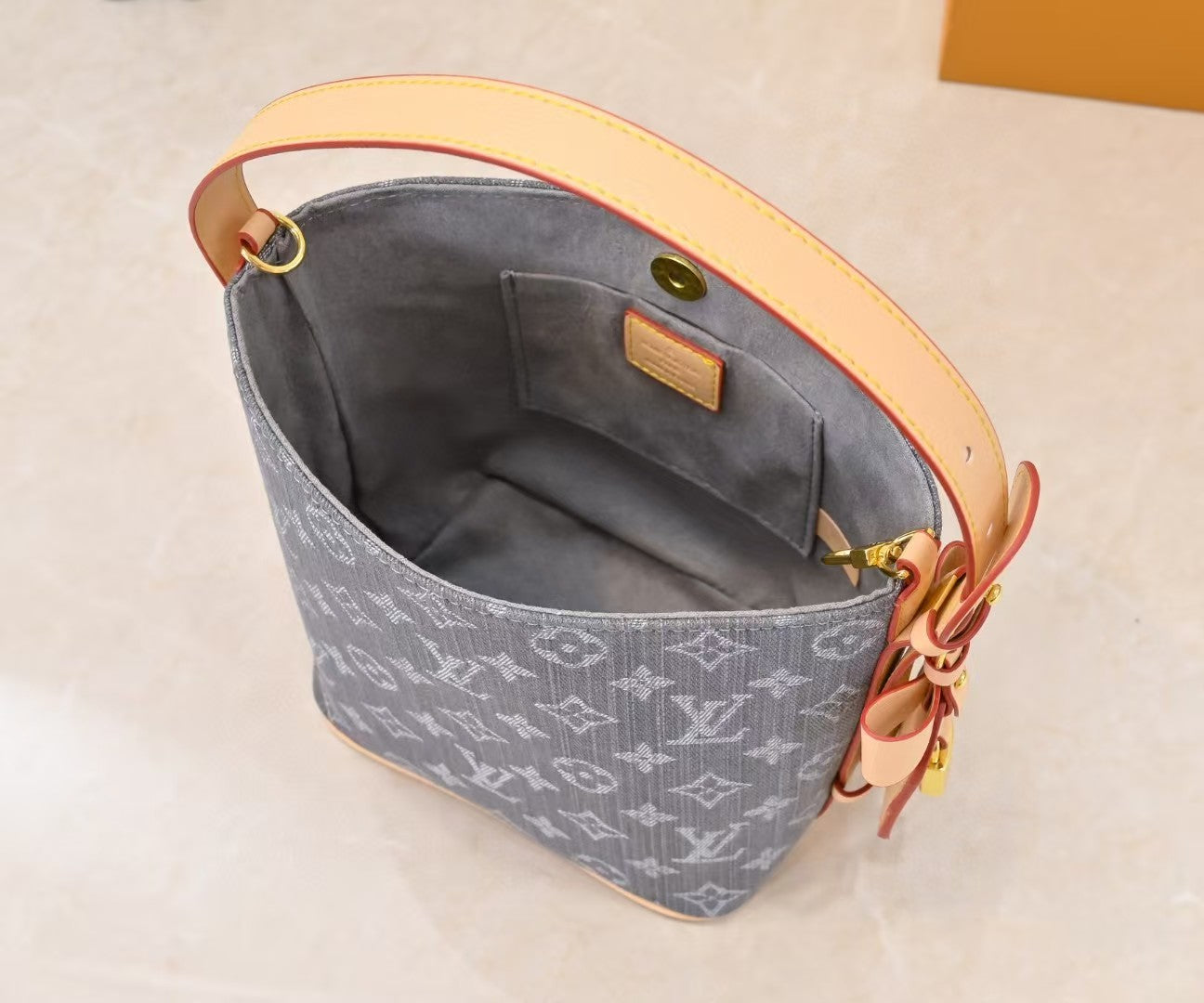 M45125 Bucket Shoulder Bag, Monogram Canvas Grey Jean.