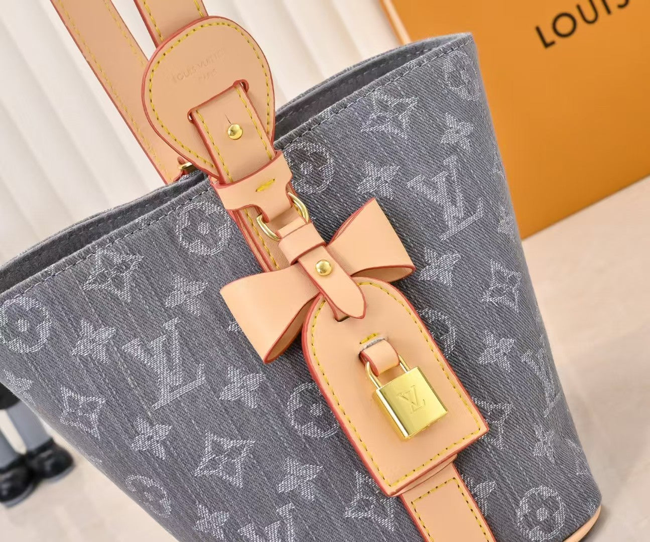 M45125 Bucket Shoulder Bag, Monogram Canvas Grey Jean.
